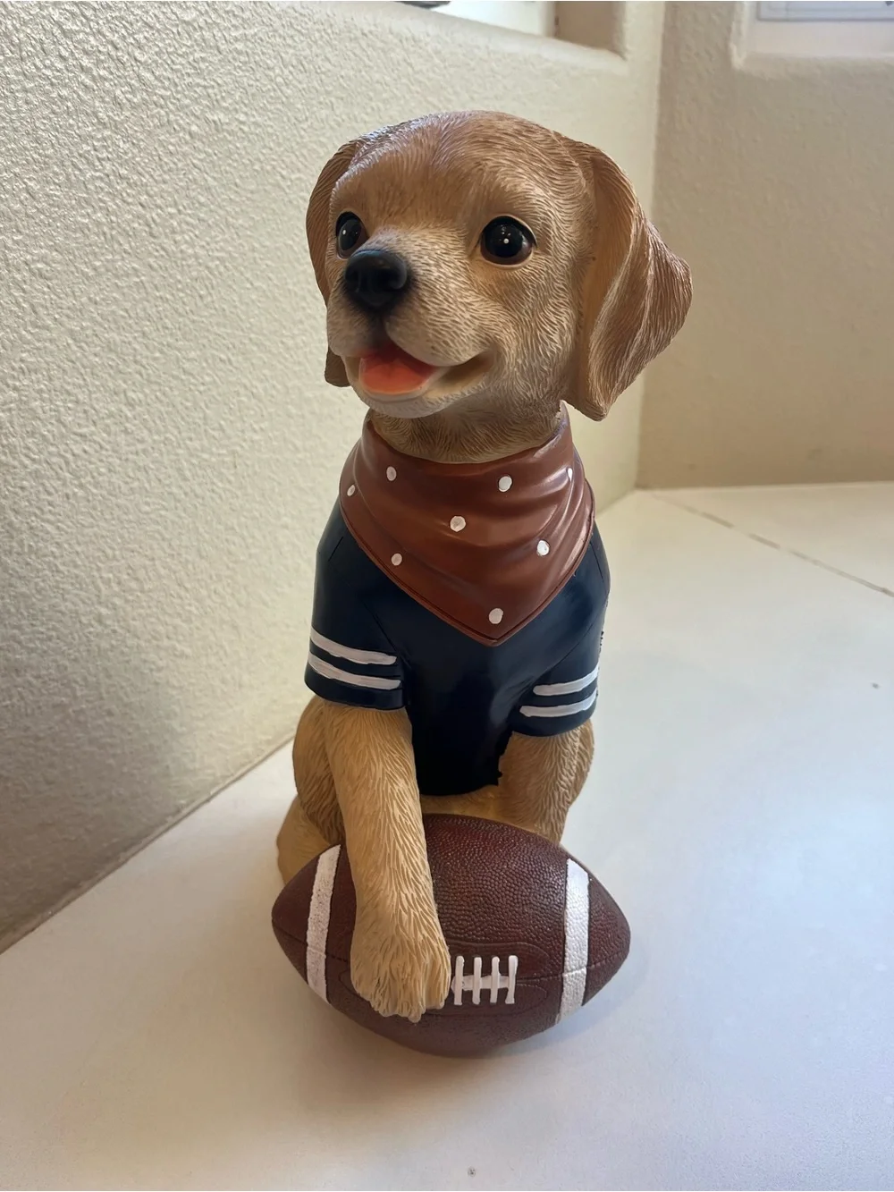 Brown Labrador Dog Figurine holding Football and Wearing a #1 Jersey